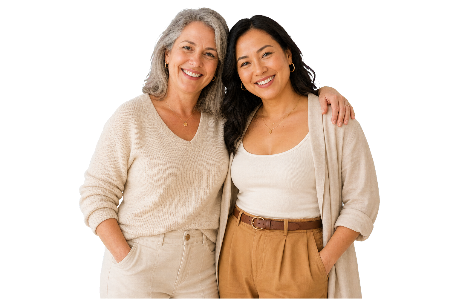 Three women smiling together in soft natural light